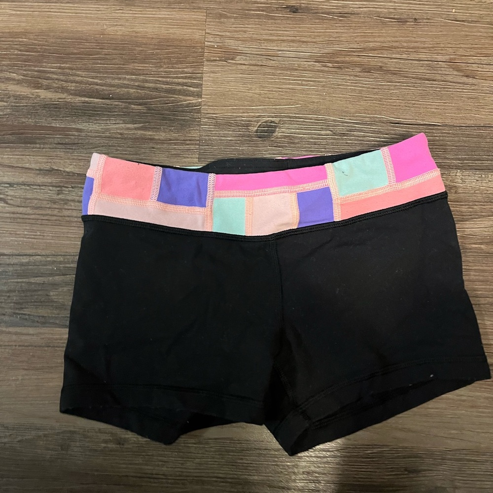 Ivivva black shorts with different colored top rim